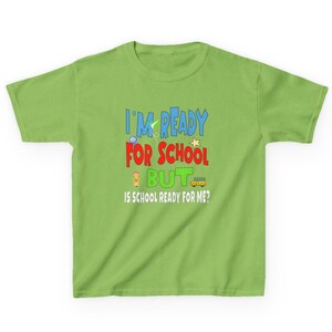 lime green kids crewneck t-shirt that reads “I’m ready for school but is school ready for me?” in colorful letters with fun icons.