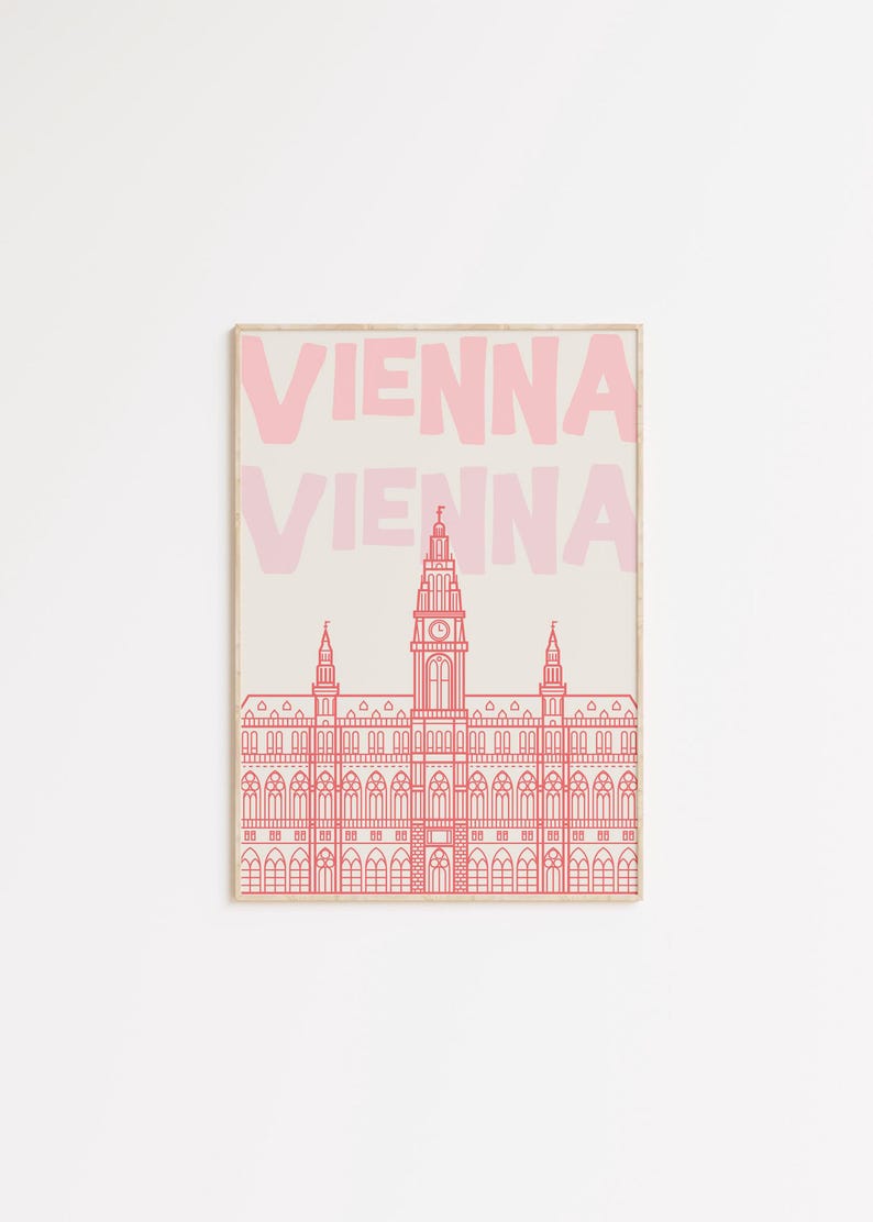 May include: Pink and beige art print featuring the word "VIENNA" in a bold font above a detailed line drawing of a building. The building has a tall central tower and multiple smaller towers.