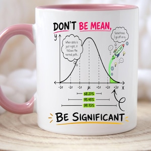 May include: A white ceramic mug with a pink handle and interior rim. The mug features a black bell curve graph with the text "DON'T BE MEAN, BE SIGNIFICANT". It includes speech bubbles with text about data and a rocket labeled "OUTLIER".