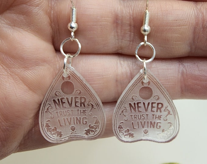 Featured listing image: BEETLEJUICE inspired Ouiji Planchette Earrings "Never Trust the Living." Made with lightweight acrylic and hypoallergenic metal.
