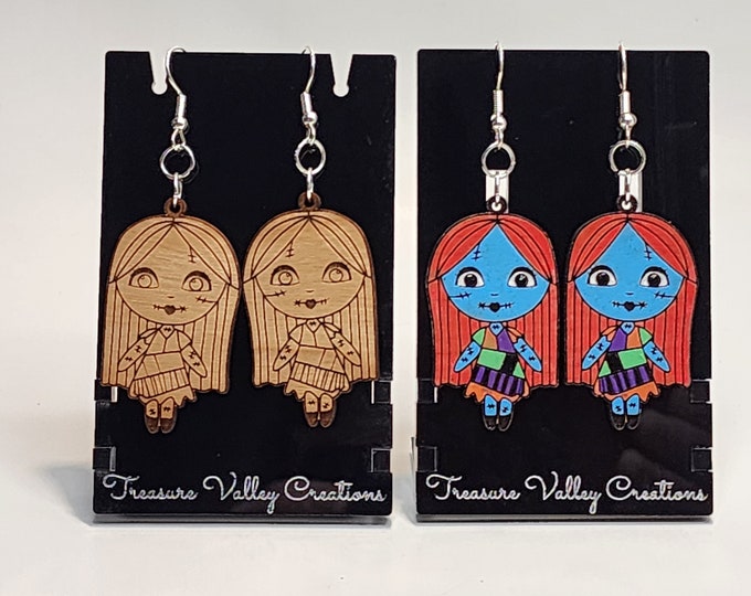 Featured listing image: NIGHTMARE BEFORE CHRISTMAS inspired earrings featuring Jack, Sally, and zero. Your choice of painted or natural Rosewood.