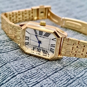 Montre pour femme, montre dorée, cadran à chiffres romains, cadran blanc, design octogonal, design élégant, cadeau pour elle, cadeau de fête des mères