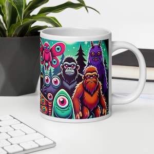 Bigfoot & Mothman Cryptid Creatures Mug - Funny Ceramic Coffee Cup - 3 Size Options