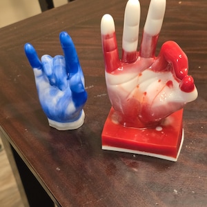 Fraternity hand sign figurine (KKY, Kappa Alpha Psi, or Phi Beta Sigma)