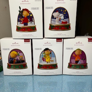 limited edition HallMark Penuts Christmas Ornaments