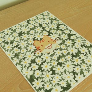 Impression d'art chat roux en fleurs blanches 20 x 25 cm