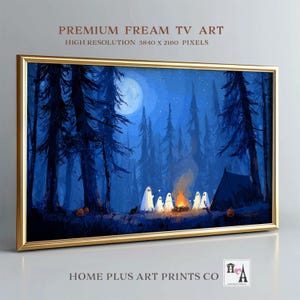 May include: A framed art print featuring a nighttime forest scene with a full moon. Silhouetted trees surround a campfire with ghost figures. The frame is gold. Text at the top reads "PREMIUM FREAM TV ART" and "HIGH RESOLUTION 3840 X 2160 PIXELS".