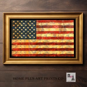 May include: Framed artwork featuring a distressed American flag design. The flag has red and yellow stripes with a blue field of stars. The artwork is in a gold frame and the text "HOME PLUS ART PRINTS CO" is at the bottom.