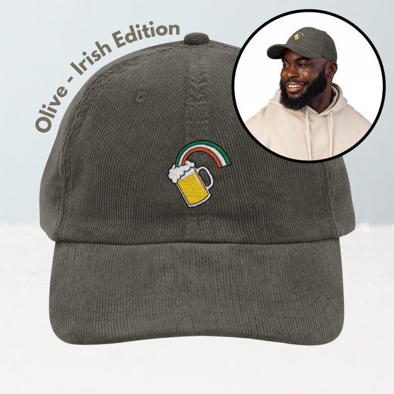 May include: Olive green corduroy baseball cap with an embroidered design of a beer mug and rainbow. The text "Olive - Irish Edition" is printed on the side. A person wearing a similar cap is shown in a circular inset.