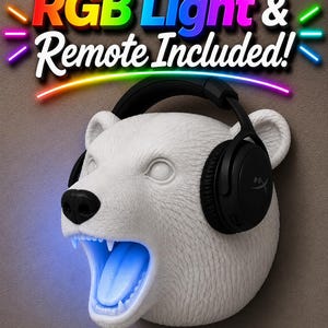 May include: A white polar bear head sculpture with black headphones and a glowing blue mouth. The text "RGB Light & Remote Included!" is displayed above the bear's head in colorful letters.