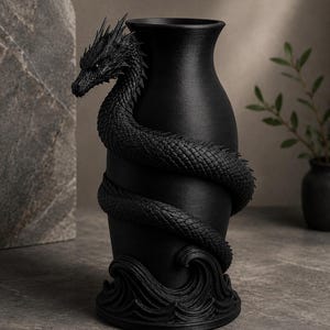 May include: A black vase with a dragon wrapped around it. The dragon's head is at the top, and its body coils down the vase. The base of the vase features a wave design. The vase is made of a matte black material.