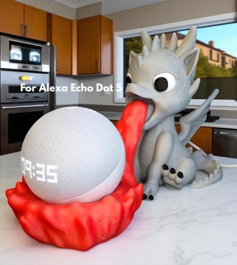 May include: A gray dragon-shaped speaker stand with a red tongue holding a white smart speaker. The speaker displays the time 09:35. The text "For Alexa Echo Dot 5" is visible.