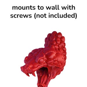 May include: A vibrant red snake head sculpture with an open mouth and forked tongue. The sculpture is designed to mount to a wall. The text "mounts to wall with screws (not included)" is above the sculpture.