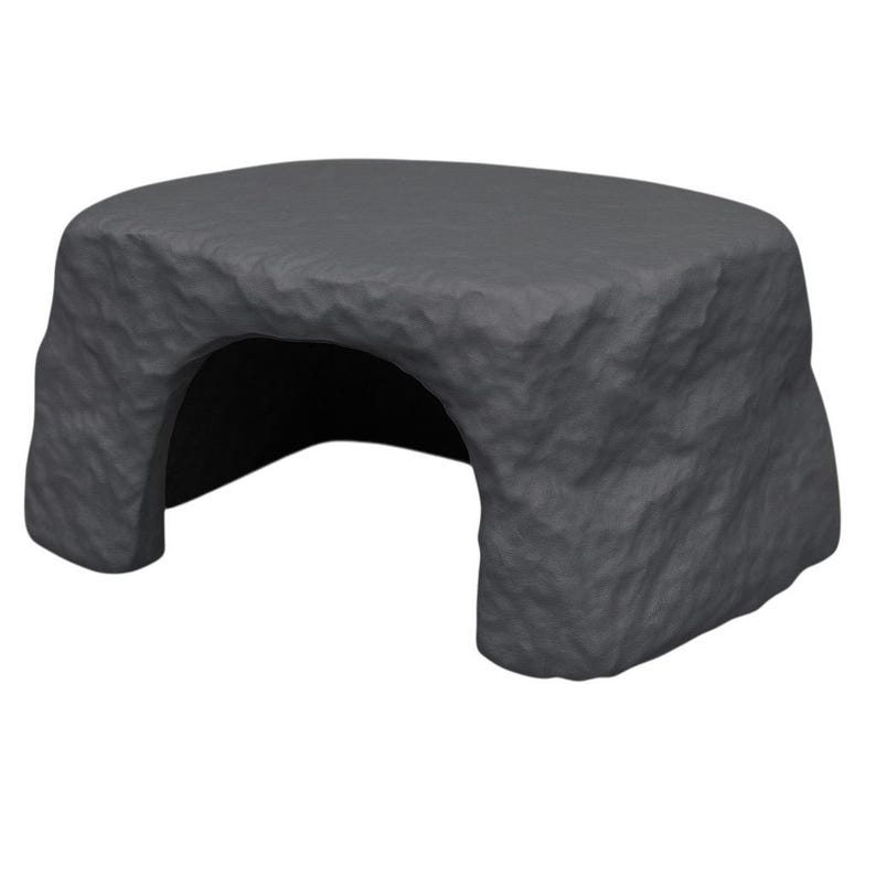 May include: A gray, rock-like structure with a rounded top and an arched opening. The surface has a textured, rough appearance. The object is designed to resemble a natural stone formation.