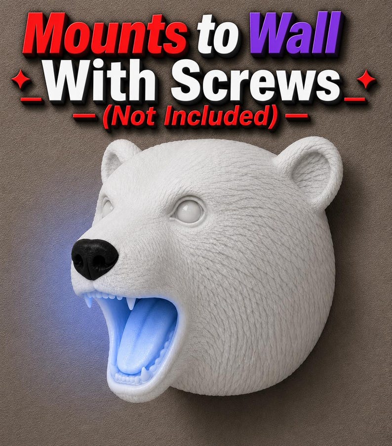 May include: White polar bear head wall decor with open mouth and blue LED light. The bear has a black nose and visible teeth. The text "Mounts to Wall With Screws (Not Included)" is at the top.