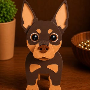 May include: A handcrafted paper dog sculpture in brown and tan. The dog has large, expressive eyes, a tan snout, and tan-colored ears. The sculpture is standing upright, showcasing its detailed design and craftsmanship. A charming decorative item.