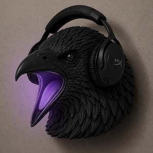 May include: A black raven head sculpture with an open beak, lit with purple light. Black headphones are on the raven's head. The sculpture has a textured, feathered appearance.