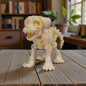 May include: A cream-colored dog skeleton figurine with articulated joints. The dog skeleton is posed on a wooden surface. The figurine has visible rib cage, spine, and skull details, creating a unique decorative item.