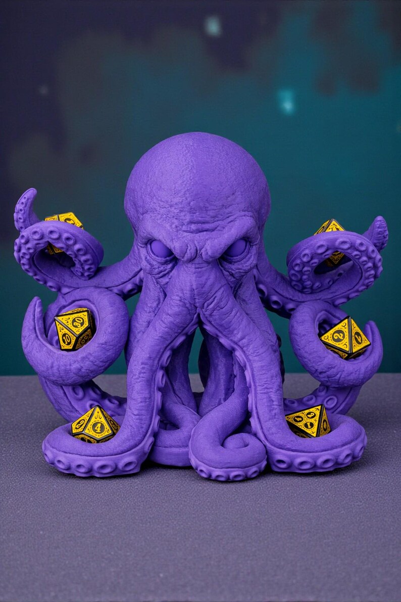 May include: A purple octopus figurine with multiple tentacles, each holding a yellow and black dice. The octopus has a detailed, textured surface. The dice are multi-sided, with visible numbers. The figurine is likely for tabletop gaming.
