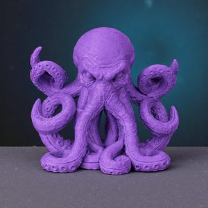 May include: A purple octopus sculpture with detailed tentacles and a textured surface. The sculpture has a stern expression and is set against a dark background. The octopus is a vibrant shade of purple.