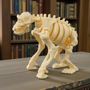 May include: A cream-colored, 3D-printed canine skeleton model. The model is posed in a standing position, showcasing the detailed structure of the rib cage, spine, and skull. The model is displayed on a dark surface.