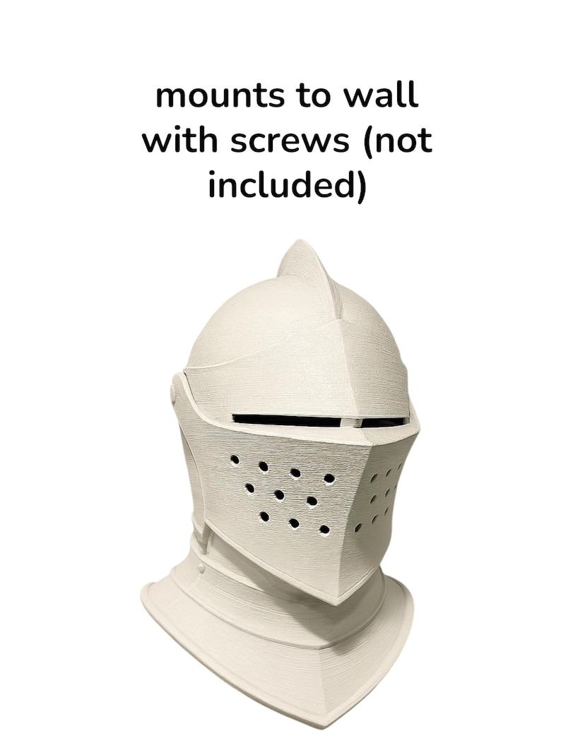 May include: A cream-colored knight's helmet with a textured surface. The helmet has a visor with small holes and a pointed top. Text on the image reads "mounts to wall with screws (not included)".