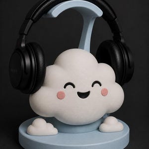 May include: A white cloud-shaped headphone stand with a smiling face and pink cheeks. The stand holds a pair of black headphones. The base and support are light blue. The headphones are black and have the brand name "SONY" printed on them.