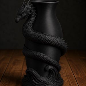 May include: A black vase with a dragon wrapped around it. The dragon's head is at the top, and its body coils around the vase. The base of the vase features a wave design. The vase is made of a matte black material.