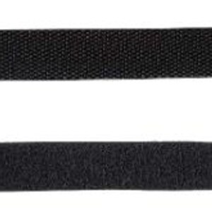 May include: Two black hook and loop cable ties. Each tie has a rectangular body with a textured surface and a rounded end. One end features a head with a hole for securing.