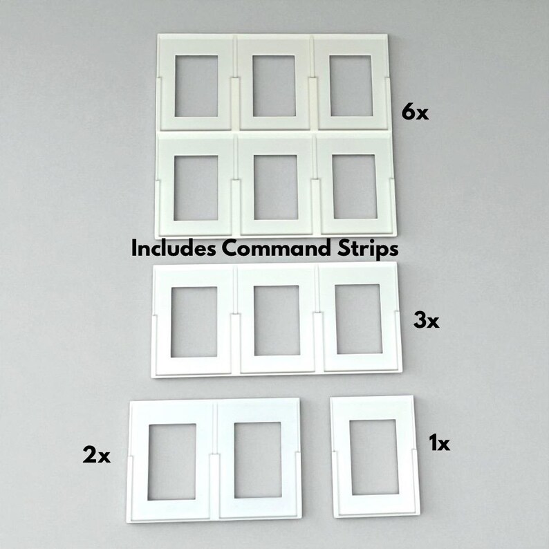 Pu&ograve; includere: Set di cornici per foto in plastica bianca in varie quantit&agrave;, tra cui set da 6, 3, 2 e 1. Il testo "Includes Command Strips" &egrave; stampato sull'immagine. Le cornici hanno un design rettangolare.
