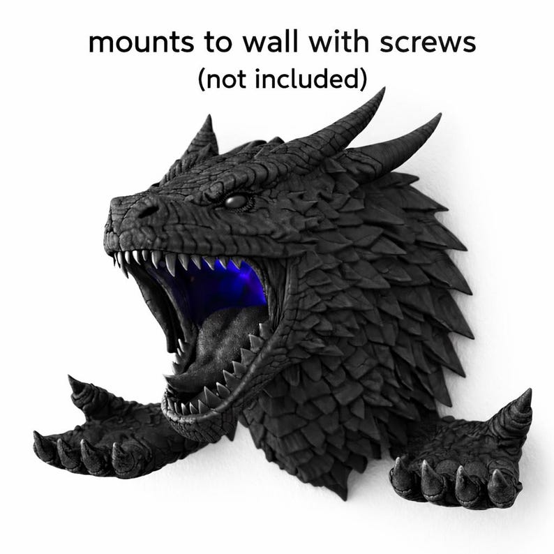 May include: Black dragon head wall decor with open mouth and blue light. The dragon has sharp teeth and textured scales. The text "mounts to wall with screws (not included)" is above the dragon.