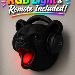 May include: Black bear head wall decor with RGB light and remote included. The bear is wearing black headphones and has a red illuminated mouth. Text above reads "RGB Light & Remote Included!"
