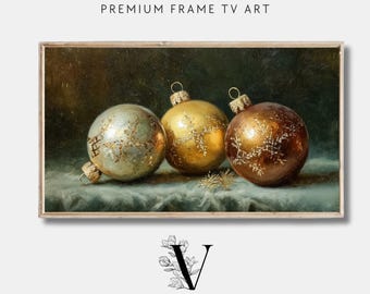 May include: A framed digital art print featuring three ornate Christmas ornaments in silver, gold, and bronze. The ornaments have intricate designs and are set against a dark, textured background. The text "PREMIUM FRAME TV ART" and "VINTAGE HEIRLOOM ART COLLECTIVE" are displayed.