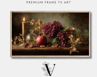 May include: A framed digital art print featuring a still life with a lit candle, a glass vase, a pomegranate, grapes, and dried fruit. The artwork has a vintage aesthetic, with the text "PREMIUM FRAME TV ART" at the top.