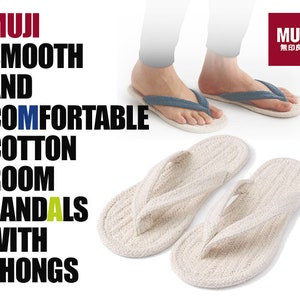 May include: White cotton room sandals with a thong style strap. The sandals are made of a soft, woven material and have a comfortable fit. MUJI 無印良品 is printed on the right side of the image.