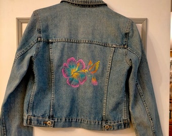 Jean jacket embroidered with a humming bird and  hibiscus
