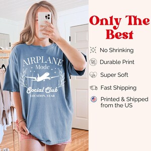 May include: A blue t-shirt with the words "AIRPLANE Mode Social Club" in white, along with a graphic of an airplane. The shirt also has the text "LOCATION, YEAR". The words "Only The Best" are in red.