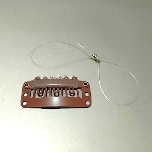 Barrette à cheveux avec cordon de sécurité kanso baha osia adhear - barrette marron