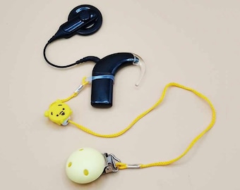 Cordón de retención individual amarillo para audífono o implante coclear