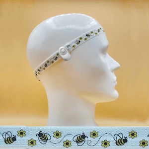 Ape bianca con fiori Fascia per capelli Baha unilaterale Baha Ponto Adhear non-grip