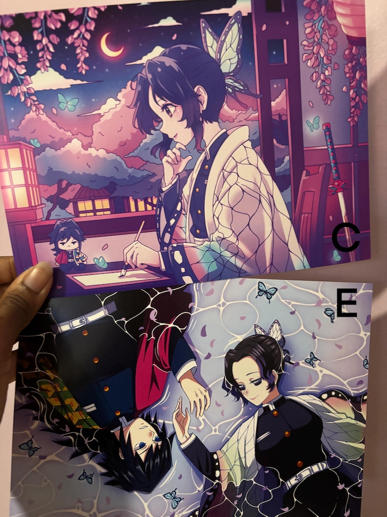 May include: Two anime art prints. One features a woman with a butterfly hair accessory against a night sky with a crescent moon. The other shows two characters with butterflies. The prints have a Japanese anime style.