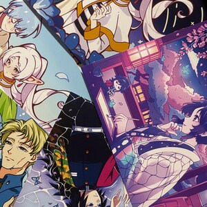 May include: A selection of anime art prints displaying diverse characters in vivid colours. The prints highlight detailed illustrations, focusing on character design and dynamic poses. The artwork incorporates fantasy elements and detailed backgrounds.