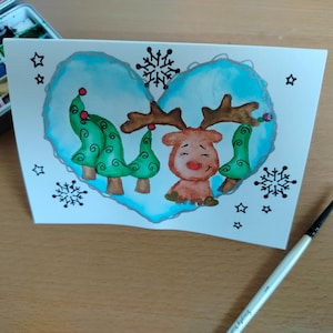 Carte de Noël ''coeurs de Noël '' petit renne
