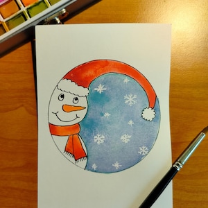 Tarjeta de navidad tarjeta de felicitación muñeco de nieve acuarela
