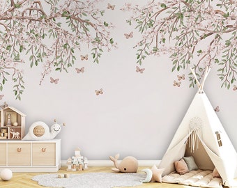 May include: A whimsical nursery scene featuring a white teepee, a wooden toy house, and a plush snail. The walls are adorned with a watercolor floral design of branches, leaves, and butterflies, creating a serene and playful atmosphere.