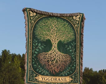 May include: A green tapestry with a woven image of Yggdrasil, the Norse World Tree, with intricate roots and branches. The tapestry has a fringe border and the text "Yggdrasil" is woven into the bottom.
