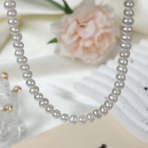 Niche light luxury 5-6mm natural freshwater pearl necklace S925 whole body sterling silver lobster buckle collarbone chain