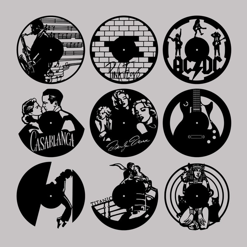 May include: Nine black and white vinyl record clock designs. The designs include a brick wall with the words "Pink Floyd", a guitar with the words "AC/DC", a couple from the movie "Casablanca", a couple from the movie "Dirty Dancing", a guitar, a couple from the movie "Titanic", and a woman with a cat.