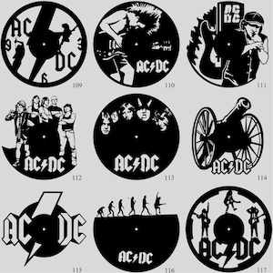 May include: Collection of black vinyl record clocks featuring the AC/DC logo and various band-related silhouettes. Designs include a clock face, band members, and a cannon. Each clock is a unique piece of rock and roll art.