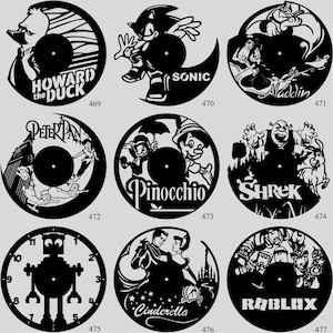 May include: A collection of black vinyl record clocks featuring various cartoon characters and themes. Designs include Howard the Duck, Sonic, Aladdin, Peter Pan, Pinocchio, Shrek, a robot, Cinderella, and Roblox.